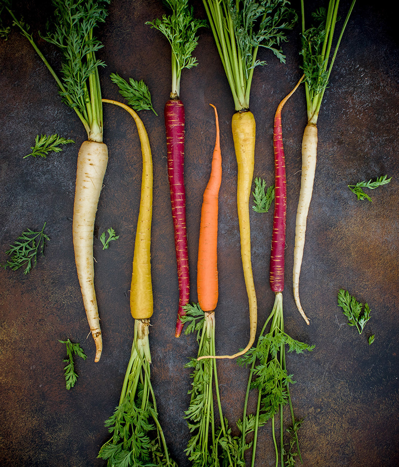 multi-colored carrots on ground